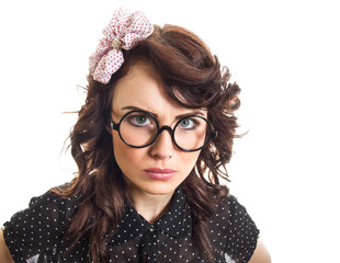 Unhappy young woman looking into the camera