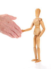 Wooden man figure shaking hands, isolated on white background