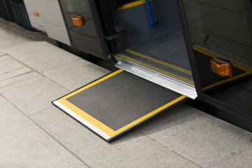 Access ramp for disabled persons and babies in a bus
