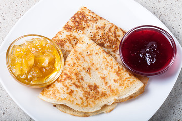 Russian pancakes - blini with two kinds of jam