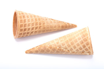 Empty sugar waffle cones on white background