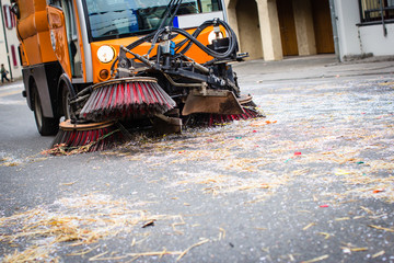 Street cleaning after a carnival party 