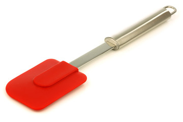 red silicon scraper on a white background