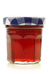 glass jar with fruit jam with room for your label, text or image