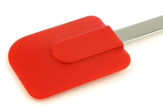 red silicon scraper on a white background