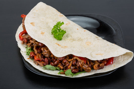 Burrito with minced meat and beans