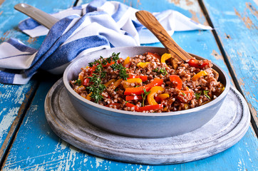 Rice red with paprika and thyme