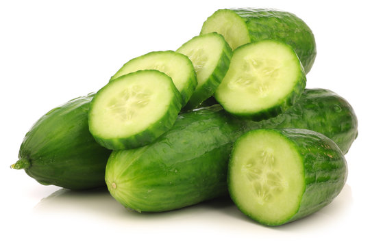 fresh turkish cucumbers on a white background
