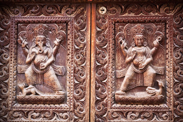 Fototapeta na wymiar Ancient nepalese wooden carving