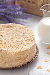 Mille-feuille cake in provence style background with milk