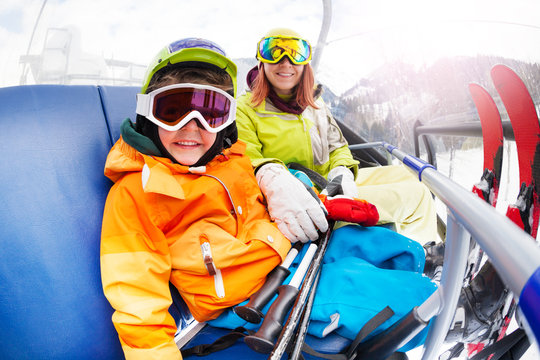 Happy Little Boy With Mom, Mountain Ski Chair Lift