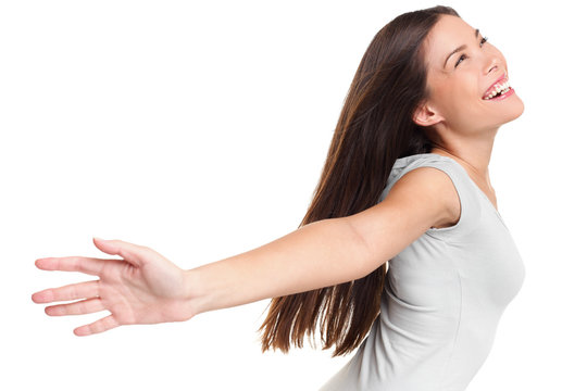 Happy carefree joyful elated woman with arms up