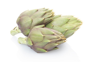 Fototapeta premium Artichokes group on white, clipping path
