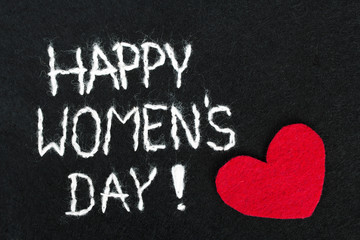 beautiful felt background for women's day with red heart