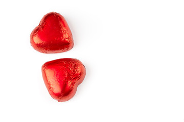 Cuori rossi su sfondo bianco