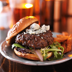 gourmet hamburger with blue cheese with sweet potato fries