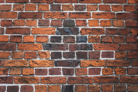 old stained brown brick wall background