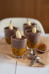 cocoa mousse with passion fruit jam and pear