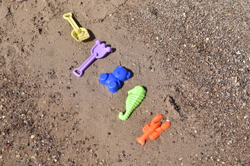 Fototapeta na wymiar Sea children toys on the red sea beach