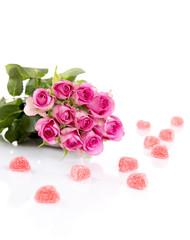 Obraz na płótnie Canvas Roses with Candy Hearts
