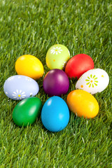 Colorful Easter Eggs on Grass in star shape