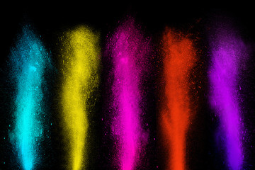 Obraz premium Freeze motion of colorful powder paint exploding streaming up