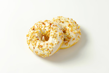Maple-glazed ring donuts with nuts
