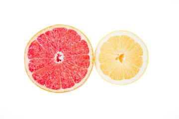 Grapefruit and lemon on a white background, texture