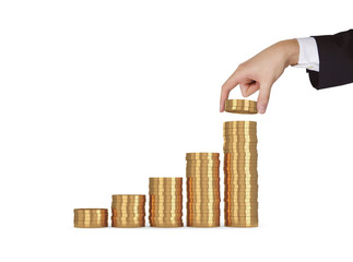 hand puts gold coins