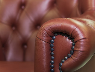 Leather,buttons and decorative nails.
