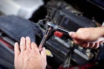 Mechanic working in auto repair garage