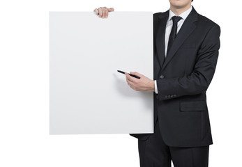businessman holding blank poster