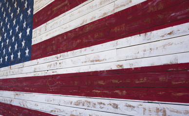 American or United States flag painted on a wooden plank wall
