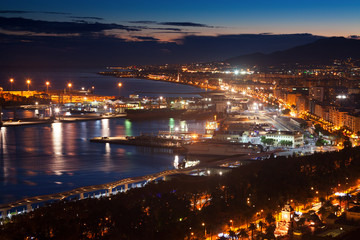 Fototapeta na wymiar Port of Malaga from castle in evening