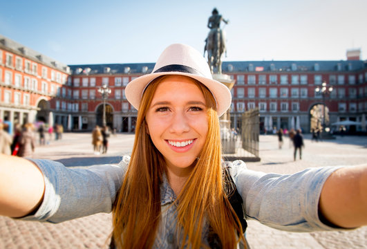 tourist woman visiting Europe in holidays taking selfie