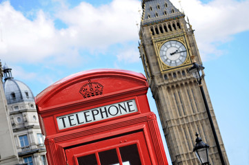 Fototapeta na wymiar Red telephone box and Big Ben in London