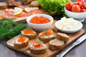 appetizers - toast with salted salmon and red caviar