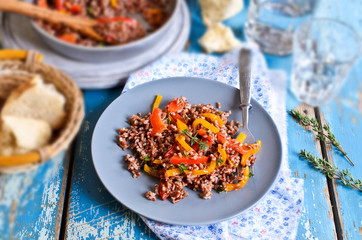 Rice red with paprika and thyme