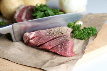 Raw meat on cutting board