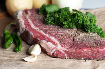 Raw meat on cutting board