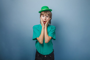 European-looking boy of ten years surprise, opened his mouth in