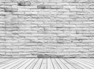 Backdrop stone wall and wood slabs in perspective for design.