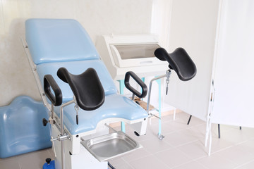 The image of blue gynecological chair