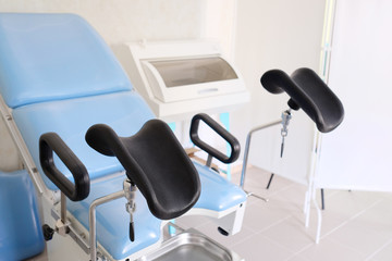 The image of blue gynecological chair