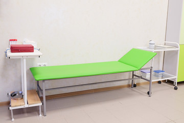 Patient examination table in a doctors office