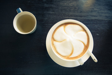 Cappuccino coffee cup with tea cup