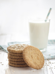 Oatmeal cookies on wooden background