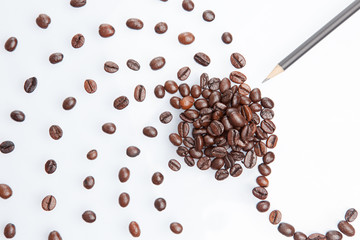 coffee beans with a pencil