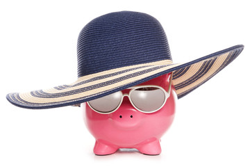 piggy bank wearing a summer hat