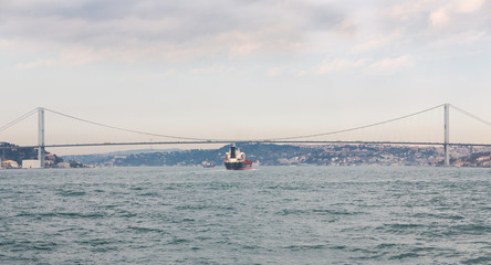 Bosphorus with buildings and suspension bridge in Istanbul